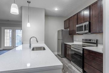 Hilliard apartment for rent - a kitchen with a white counter top and a sink