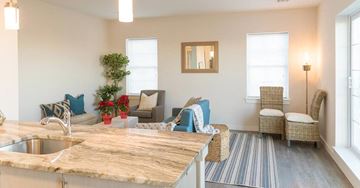 Keansburg apartment for rent - a kitchen and living room with a couch and a table