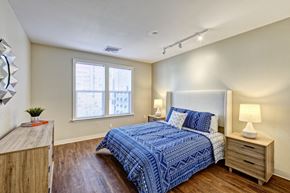 Suffield apartment for rent - Bedrooms are spacious, featuring nice large windows and modern wood flooring.