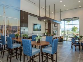 Oxnard apartment for rent - a dining room with a table and chairs