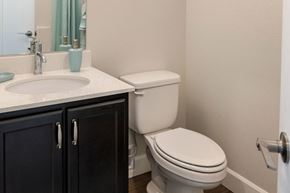 Vancouver apartment for rent - a bathroom with a toilet and a sink