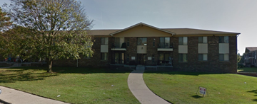 Shelby Twp apartment for rent - an apartment building with a sidewalk in front of it