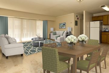 Silver Spring apartment for rent - a living room and dining room with a table and chairs