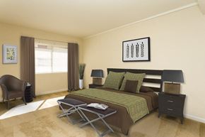 Silver Spring apartment for rent - a bedroom with a bed and a chair