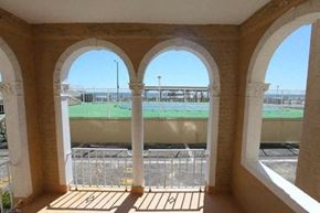 Ventnor apartment for rent - a view from a balcony of a train on the tracks