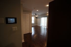 Philadelphia apartment for rent - an empty living room with wood floors and a ceiling fan