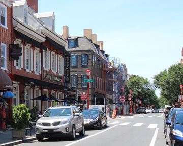 Philadelphia apartment for rent - a busy city street with cars driving down it