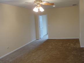 Philadelphia apartment for rent - an empty living room with a ceiling fan