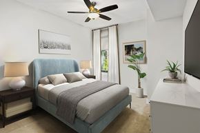 Hanover apartment for rent - a bedroom with a bed and a ceiling fan