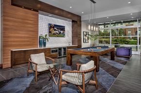 Hanover apartment for rent - a billiards room with a pool table and chairs