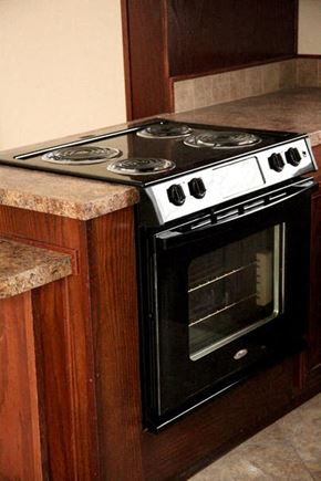 Grand Island apartment for rent - a stove top oven sitting on top of a kitchen counter