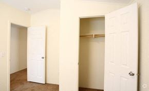 Rock Springs apartment for rent - A white door is open to a room with a shelf.
