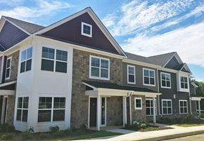 Centreville apartment for rent - a large house with a sidewalk in front of it