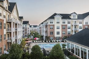 Laurel apartment for rent - an aerial view of an apartment building with a swimming pool