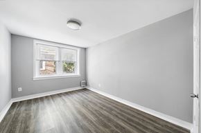 Philadelphia apartment for rent - A room with a window and a door.