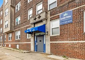 Philadelphia apartment for rent - the front of a brick building with a blue door