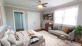 Chicago apartment for rent - A living room with a grey couch and a coffee table.