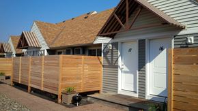 Madison apartment for rent - a row of houses with a wooden fence in front of them