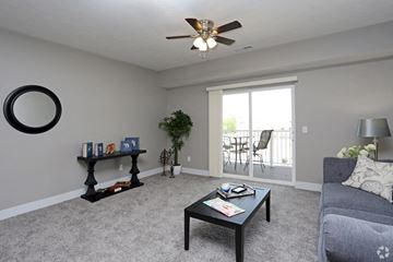Lincoln apartment for rent - a living room with a couch and a coffee table