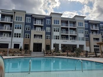 View of the pool, deck and lounge area behind 3800 acqua