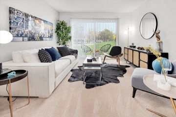 Farmington Hills apartment for rent - a living room with a couch and a table