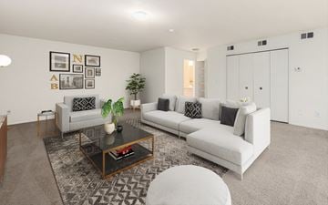Farmington apartment for rent - a living room with couches and a coffee table
