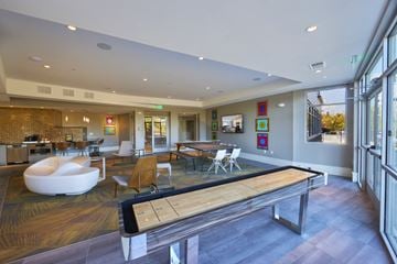 Ann Arbor townhouse for rent - a large living room with a ping pong table