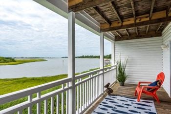 Expansive balconies with waterfront view