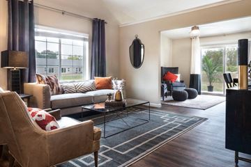Grimes apartment for rent - a living room with couches and chairs and a rug