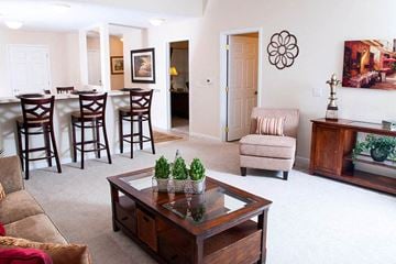 Olmsted Twp apartment for rent - a living room and dining room with a table and chairs