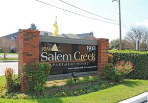 San Antonio apartment for rent - the sign in front of the salem creek apartment homes entrance