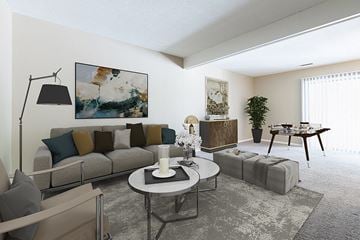 Omaha apartment for rent - a living room with a couch and a table