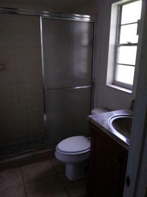 Winter Springs house for rent - A small bathroom with a toilet and a sink.