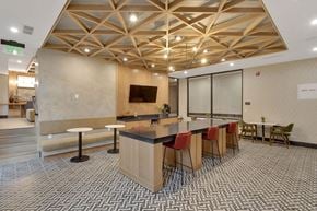Denver apartment for rent - a conference room with a long table and chairs