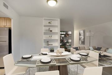 Denver apartment for rent - a living room and dining room with a table and chairs
