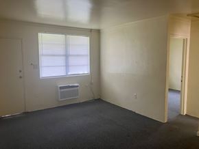 Beaufort Available Now apartment for rent - A room with a window and air conditioner.