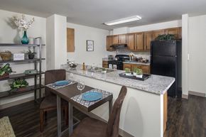 Marysville apartment for rent - A kitchen with a table set for two.