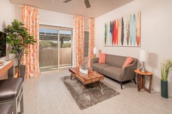 Living room with couch and sliding glass doors