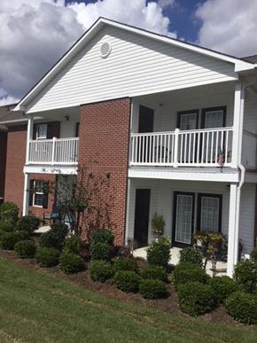 Ashburn apartment for rent - a white house with a porch and a balcony