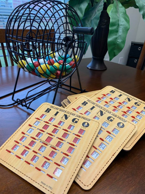 Moultrie apartment for rent - a game of bingo on a table next to a fan