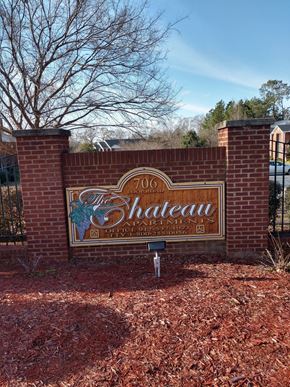 Vidalia apartment for rent - a sign for shakespeare park in front of a brick wall