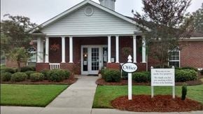 Douglas apartment for rent - a church with a sign in front of a house