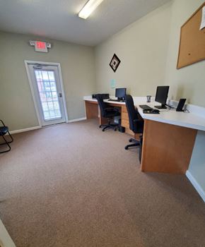 Vidalia apartment for rent - an office with two desks and two computers