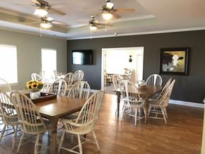 Rincon apartment for rent - a dining room with a table and chairs and a tv