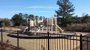 Rincon apartment for rent - a playground with slides and other toys in a park