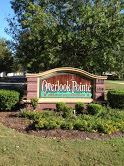 Cordele apartment for rent - a sign for an arbor park in a park