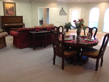 Waycross apartment for rent - a living room with a dining table and a piano