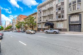 San Francisco apartment for rent - A street view with cars and buildings on both sides.