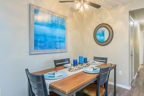 Roanoke apartment for rent - a dining room with a wooden table and chairs