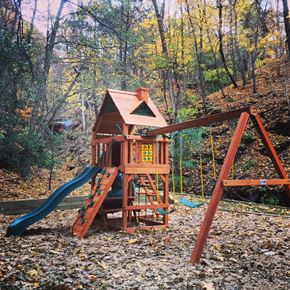 Ithaca apartment for rent - a wooden swing set in the middle of the woods